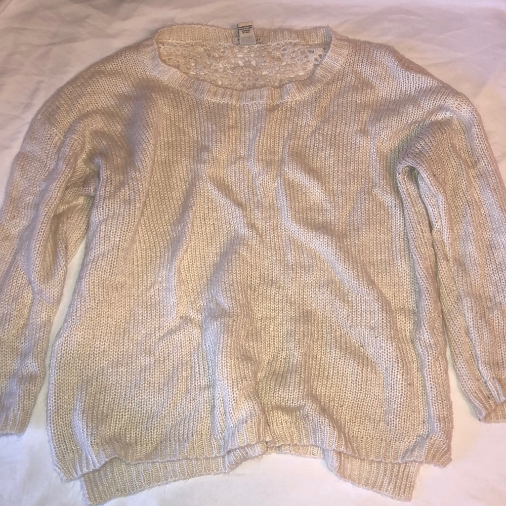 Cream sweater with knit detail